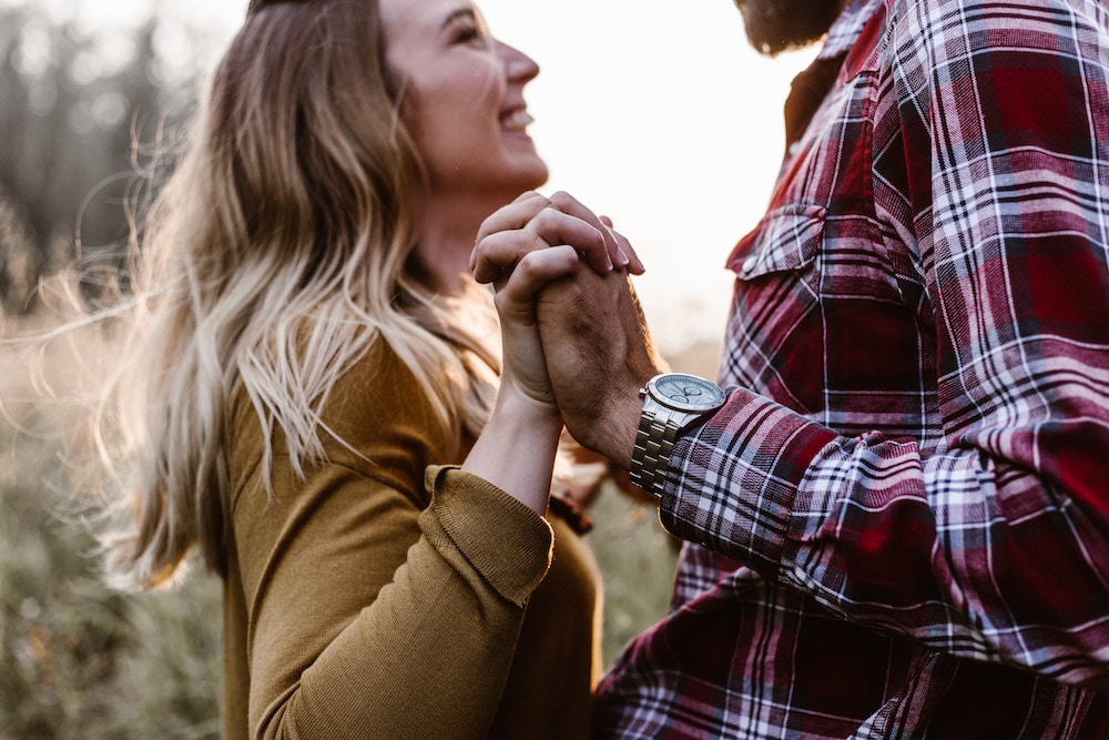 couple holding hands | 13 Questions to Ask for a Marriage That Lasts